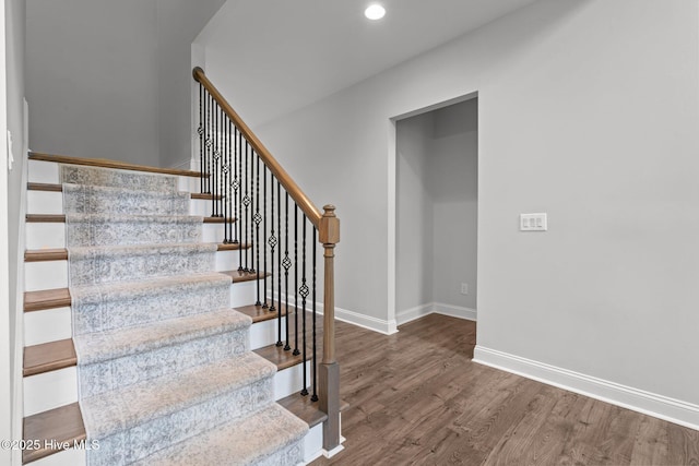 224 Pristine Ct, West End, NC 27376 - stairway featuring wood finished floors, baseboards, and recessed lighting
