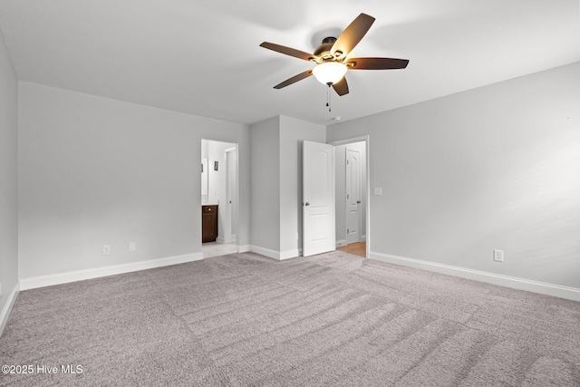 224 Pristine Ct, West End, NC 27376 - unfurnished bedroom featuring light colored carpet, baseboards, ensuite bath, and a ceiling fan
