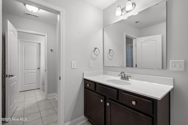 224 Pristine Ct, West End, NC 27376 - bathroom featuring tile patterned floors, vanity, and baseboards