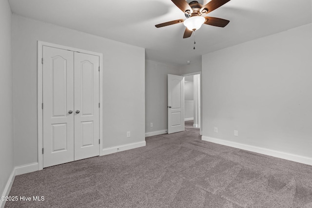 224 Pristine Ct, West End, NC 27376 - unfurnished bedroom featuring carpet flooring, a closet, baseboards, and a ceiling fan