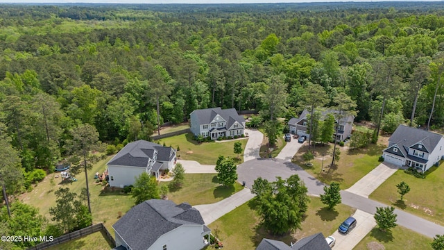 224 Pristine Ct, West End, NC 27376 - aerial perspective of suburban area with a forest