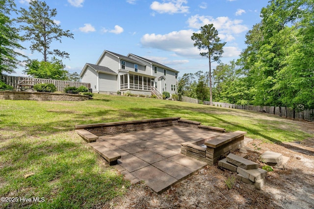 224 Pristine Ct, West End, NC 27376 - rear view of house with a sunroom and a patio area