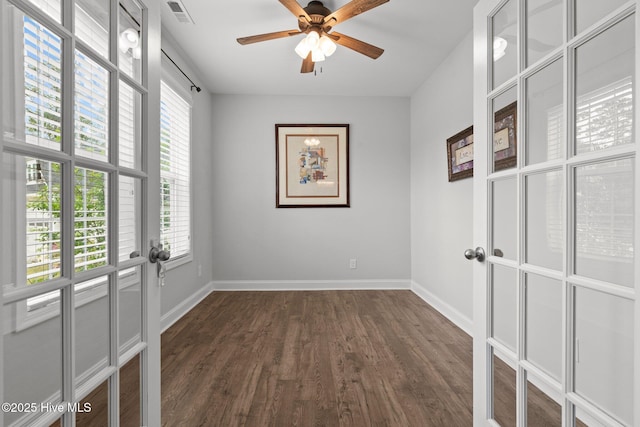 224 Pristine Ct, West End, NC 27376 - unfurnished room featuring dark wood-style flooring, baseboards, and a ceiling fan