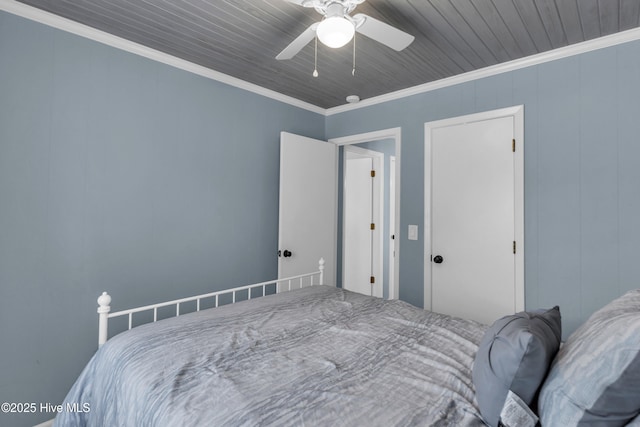 2005 E Oak Island Dr, Oak Island, NC 28465 - bedroom with crown molding and ceiling fan