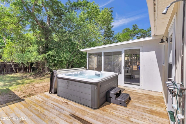 2005 E Oak Island Dr, Oak Island, NC 28465 - wooden terrace with fence, a sunroom, and a hot tub