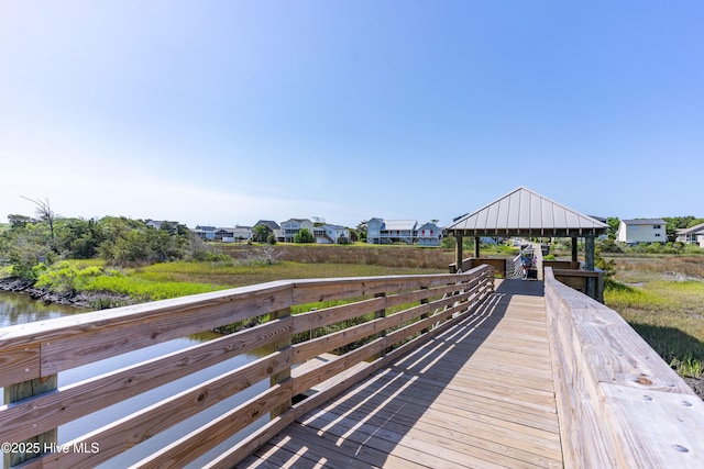 2005 E Oak Island Dr, Oak Island, NC 28465 - dock area featuring a water view and a gazebo