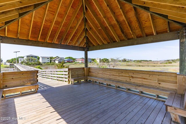 2005 E Oak Island Dr, Oak Island, NC 28465 - wooden deck with a residential view