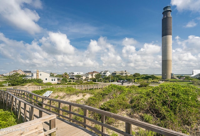 2005 E Oak Island Dr, Oak Island, NC 28465 - surrounding community with a residential view and a wooden deck