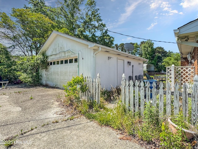 detached garage with fence