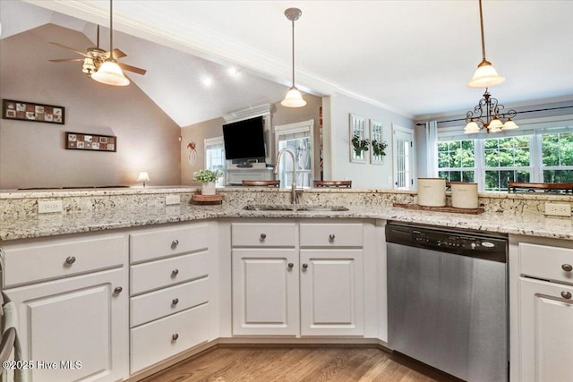 1171 Airport Rd, Pikeville, NC 27863 - kitchen featuring stainless steel dishwasher, a sink, light wood finished floors, and white cabinetry