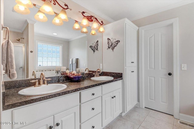 1171 Airport Rd, Pikeville, NC 27863 - full bath with crown molding, a sink, tile patterned flooring, and visible vents