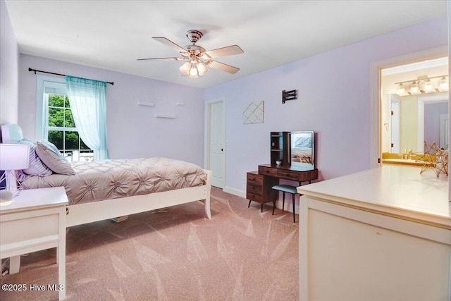 1171 Airport Rd, Pikeville, NC 27863 - bedroom with a ceiling fan, baseboards, and light colored carpet