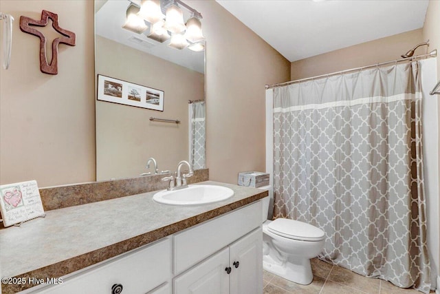 1171 Airport Rd, Pikeville, NC 27863 - bathroom featuring vanity, tile patterned flooring, visible vents, an inviting chandelier, and toilet