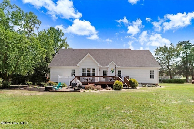 1171 Airport Rd, Pikeville, NC 27863 - back of property with a lawn and a deck