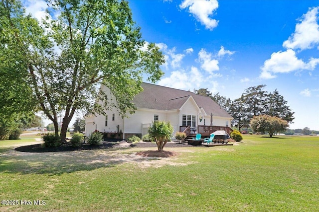 1171 Airport Rd, Pikeville, NC 27863 - back of house with a lawn, an attached garage, and a wooden deck