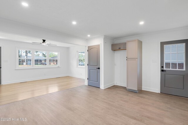 unfurnished living room featuring light wood-type flooring, recessed lighting, ceiling fan, and ornamental molding