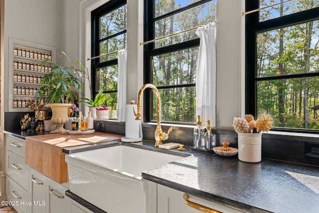 628 E Harborside Rd, Oriental, NC 28571 - interior details with white cabinets and a sink