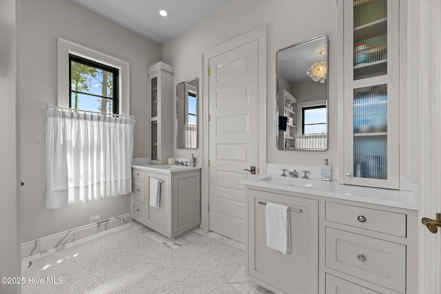 628 E Harborside Rd, Oriental, NC 28571 - bathroom with a sink, two vanities, and marble finish floor