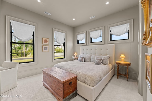628 E Harborside Rd, Oriental, NC 28571 - bedroom with light carpet, visible vents, and recessed lighting