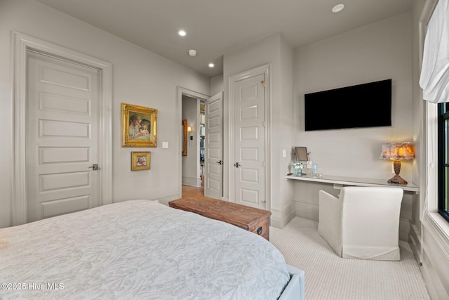 628 E Harborside Rd, Oriental, NC 28571 - carpeted bedroom with built in study area, baseboards, and recessed lighting