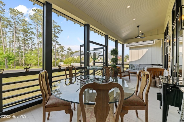 628 E Harborside Rd, Oriental, NC 28571 - sunroom / solarium with ceiling fan, lofted ceiling, outdoor dining space, and wood finished floors