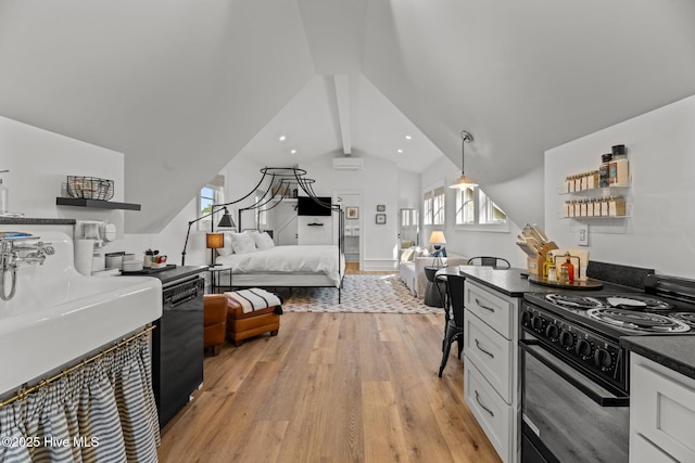 628 E Harborside Rd, Oriental, NC 28571 - bedroom featuring a wall mounted air conditioner, recessed lighting, light wood finished floors, a sink, and vaulted ceiling with beams