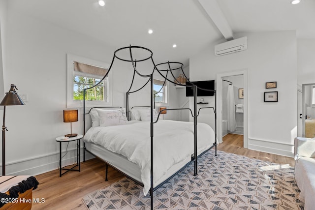 628 E Harborside Rd, Oriental, NC 28571 - bedroom featuring light wood finished floors, a wall mounted air conditioner, baseboards, and vaulted ceiling with beams