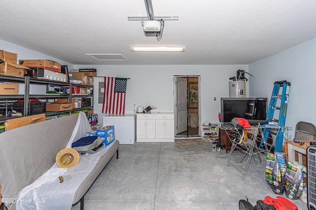 garage with water heater, a garage door opener, and refrigerator