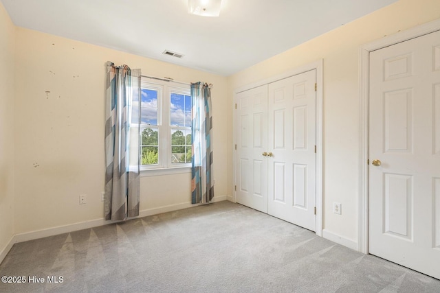 1601 Castalia Dr, Cary, NC 27513 - unfurnished bedroom with carpet flooring, baseboards, and a closet