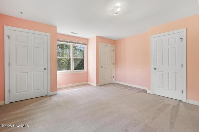 1601 Castalia Dr, Cary, NC 27513 - unfurnished bedroom featuring carpet floors and baseboards
