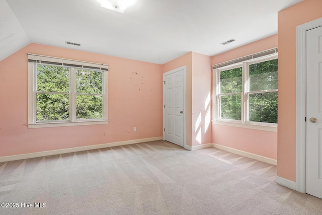 1601 Castalia Dr, Cary, NC 27513 - unfurnished room featuring carpet flooring, baseboards, and lofted ceiling