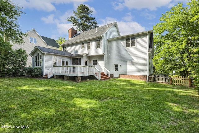 1601 Castalia Dr, Cary, NC 27513 - back of house featuring a wooden deck and a chimney