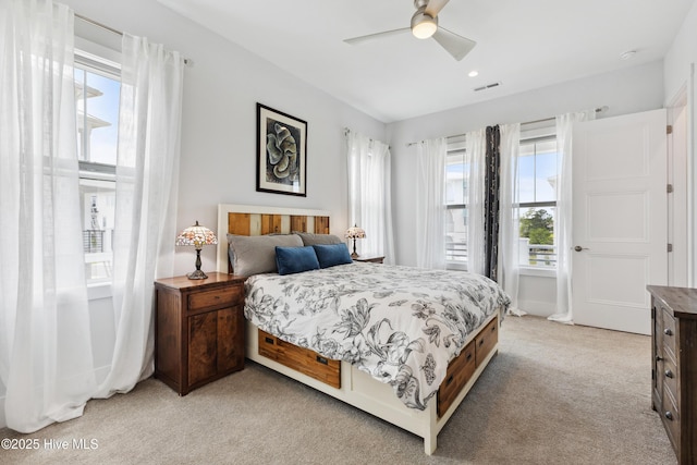 729 Waterstone Dr, Wilmington, NC 28411 - bedroom featuring multiple windows, light colored carpet, ceiling fan, and recessed lighting