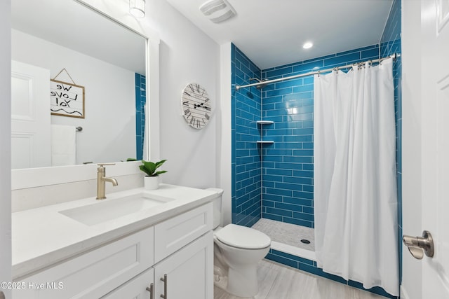 729 Waterstone Dr, Wilmington, NC 28411 - full bath featuring a stall shower, toilet, vanity, and recessed lighting