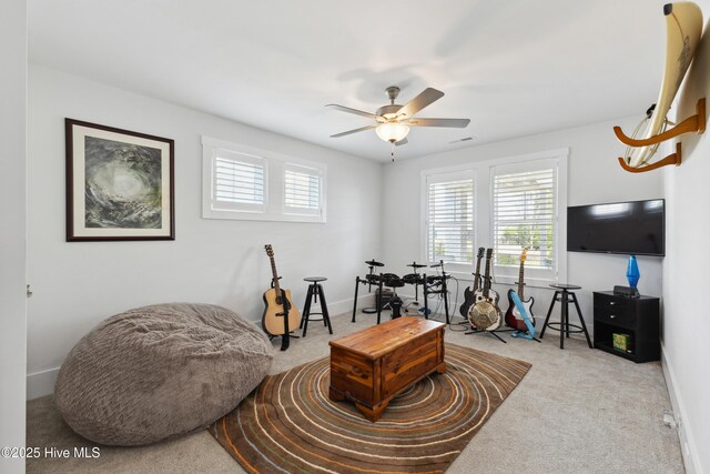 729 Waterstone Dr, Wilmington, NC 28411 - carpeted living room with ceiling fan and baseboards