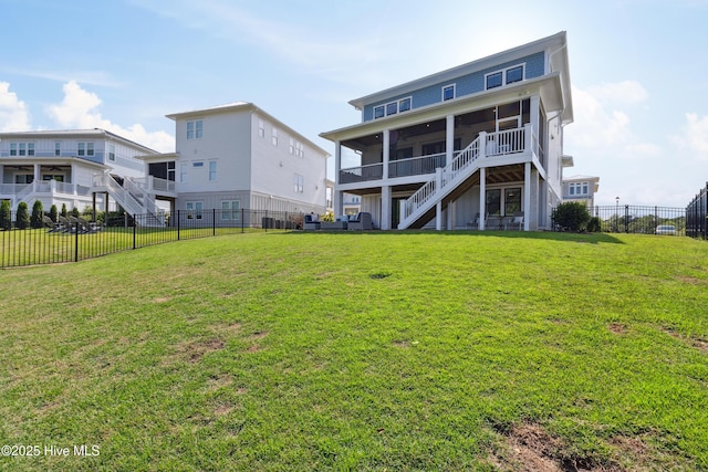 729 Waterstone Dr, Wilmington, NC 28411 - back of house with stairway and a sunroom