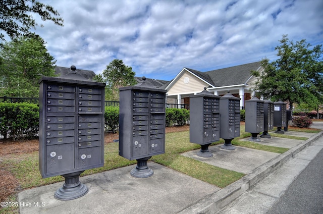 view of home's community with mail area