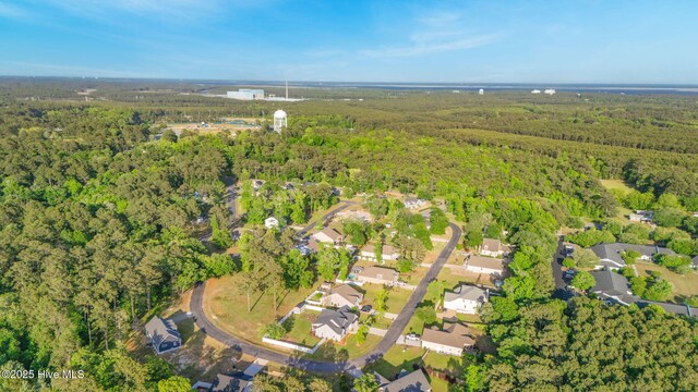 drone / aerial view with a forest view