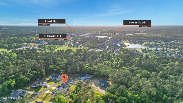 bird's eye view with a forest view
