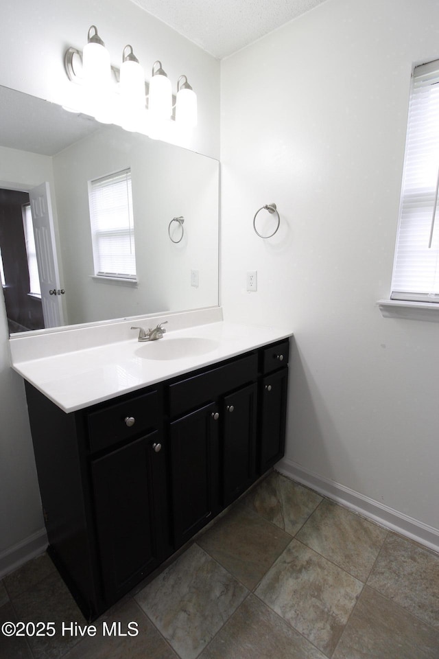 205 S Creek Dr, Jacksonville, NC 28540 - bathroom featuring vanity, baseboards, and tile patterned flooring
