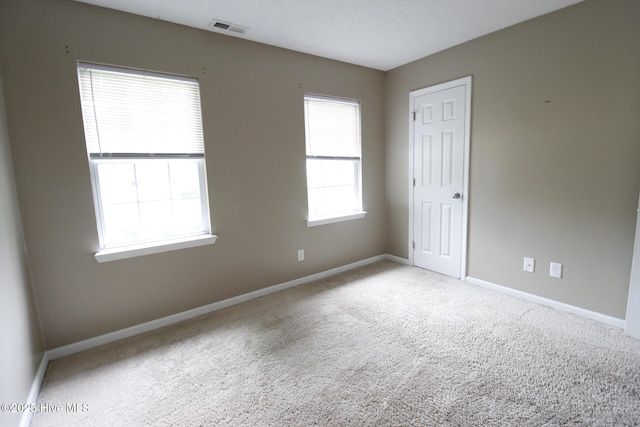 205 S Creek Dr, Jacksonville, NC 28540 - carpeted empty room with baseboards