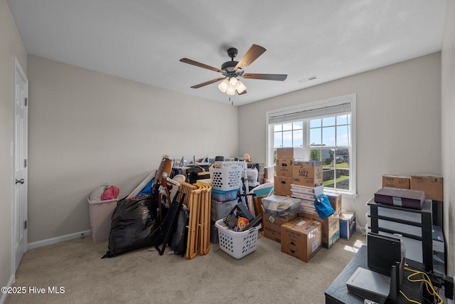 interior space featuring ceiling fan, visible vents, and baseboards