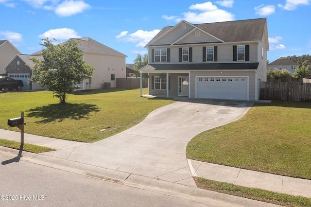 view of front of property with concrete driveway, an attached garage, fence, and a front yard