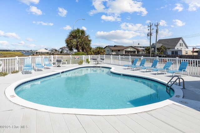 602 W Fort Macon Rd Unit 135, Atlantic Beach, NC 28512 - community pool with fence and a patio area