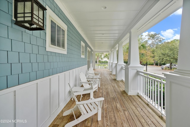 wooden deck featuring a porch
