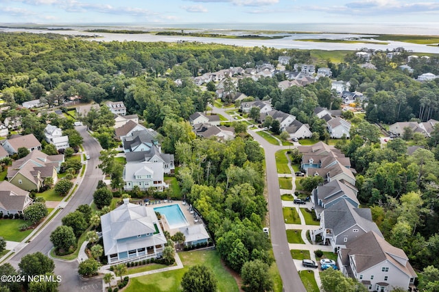 aerial view with a residential view and a water view
