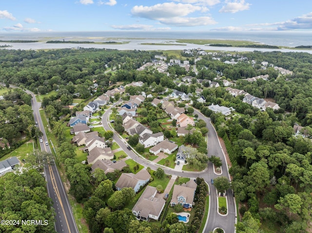 bird's eye view featuring a water view and a residential view