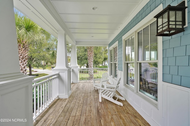 wooden deck featuring a porch