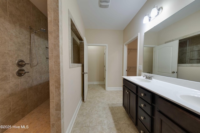 5225 National Garden Trl, Winnabow, NC 28479 - full bath featuring double vanity, a tile shower, and a sink