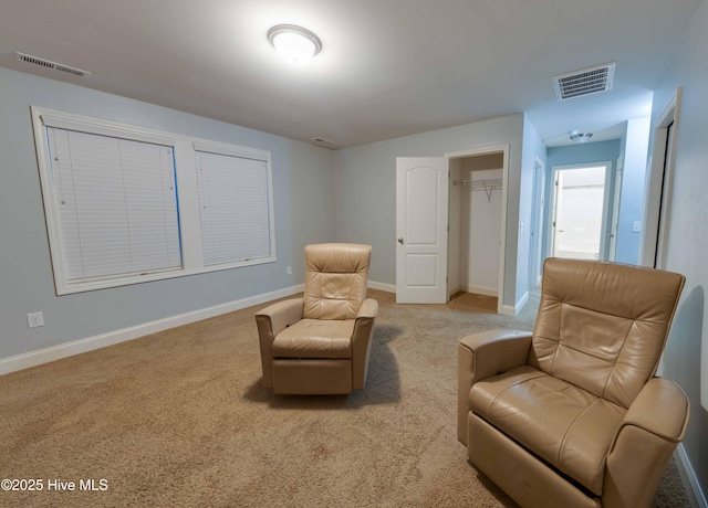 5225 National Garden Trl, Winnabow, NC 28479 - sitting room featuring baseboards, light carpet, and visible vents